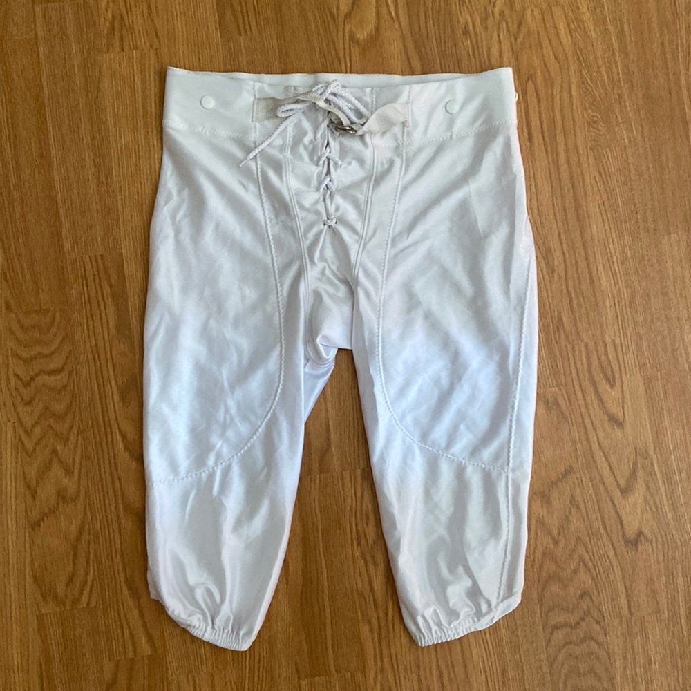 Gently pre owned football pants from TeamWork size 28-30. Pads not included